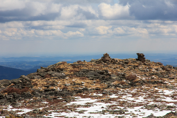As I approached the cairn it moved.  The marmot was sleeping right on top.