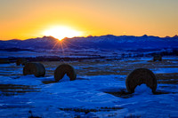 A field with some drifted snow and bales I've been eyeing.