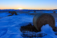 A field with some drifted snow and bales I've been eyeing.