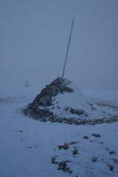 Summit cairn in the gloom